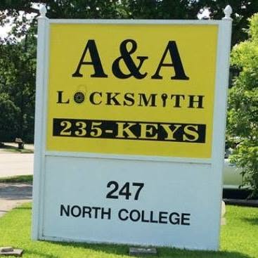 The yellow and black A & A Locksmith roadside sign reading 235-KEYS